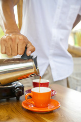 Barista preparing fresh a coffee