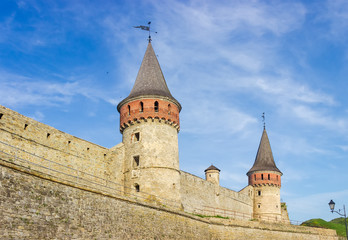 Fototapeta na wymiar Defense towers and wall of mediaeval fortress, Kamianets-Podilskyi, Ukraine