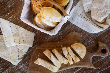 Homemade fresh baked bread on the wooden table