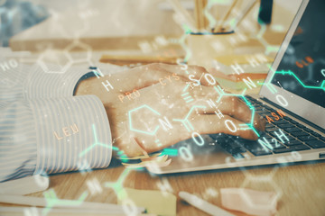 Science formula hologram with man working on computer on background. Education concept. Double exposure.