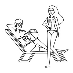 young couple relaxing in beach chair with balloon toy