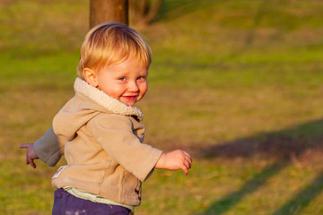 Playing, laughing  and smiling baby boy