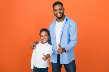 Millennial Afro Father And Cute Daughter Showing Thumbs Up