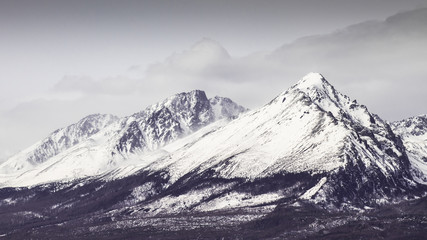 View of mountain peaks and snow in winter time, High Tatras