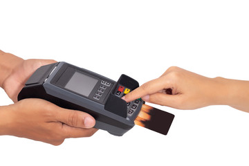 close up of hand entering credit card pin code for security password in credit card swipe machine at point of sale terminal isolated on white background with clipping path