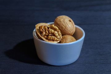 Walnuts on the blue background