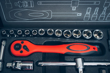 Vehicle service station. Mechanic workshop essential instruments. Closeup of open box with wrench...
