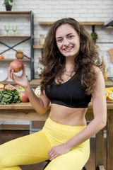 Fototapeta premium Brunette woman in the kitchen