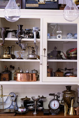 Old fashioned items on wooden shelf. Colorful of ancient collection in vintage style. Royalty high quality free stock image.