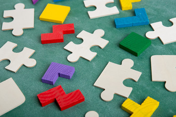 Creative solution for idea - business concept, jigsaw puzzle on the blackboard