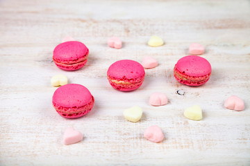 Strawberry macarons and marshmallows