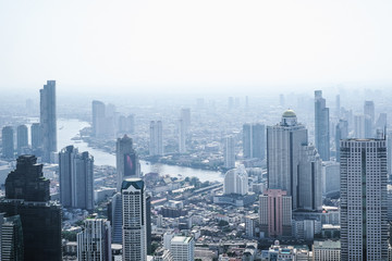 Fototapeta na wymiar Bangkok, Thailand - Mar 29, 2019 :Photos of Bangkok City line, landscape and skyscrapers taken from the rooftop of the new tallest building of Bangkok city, the King Power Mahanakhon Skywalk