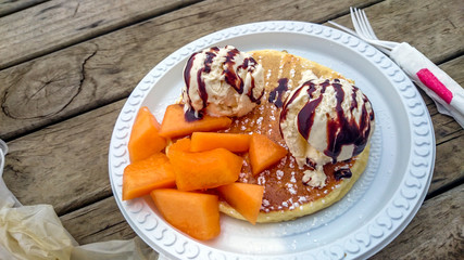 Pancakes with melon and ice cream