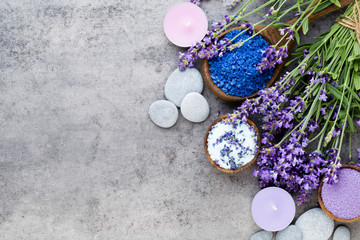 Essential lavender salt with flowers top view.