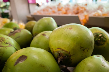 coconut fruit stacked on the marketplace