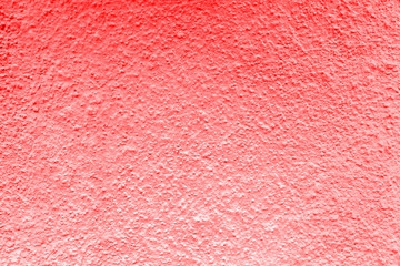 An old ragged plaster red wall texture for background,rough cement wall