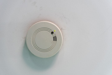 smoke alarm on a dirty roof in australia