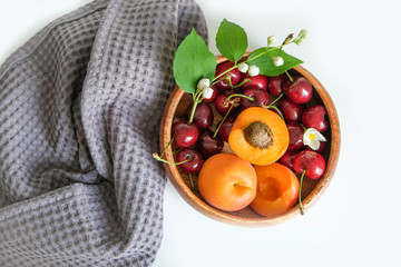 Wooden rape with summer fresh berries. Cherry and Apricot. Healthy food. Fruits.