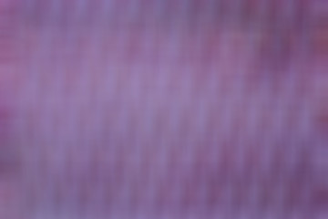 Violet abstract background with blurred mesh texture.