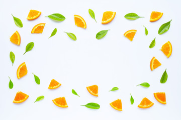 High vitamin C, Juicy and sweet. Fresh orange fruit with green leaves  on white.