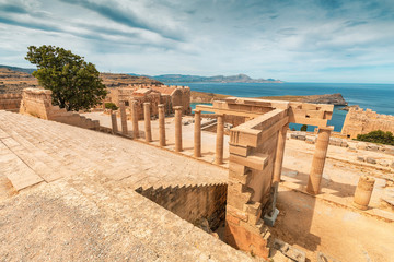 Famous tourist attraction - Acropolis of Lindos. Ancient architecture of Greece. Travel destinations of Rhodes island