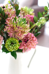 Bouquet of beautiful pink and green ranunculus flowers