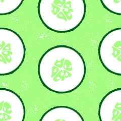 Seamless pattern with sliced cucumber - summer season vegetable. Close up drawing of cut cucumber. Green grunge backdrop.