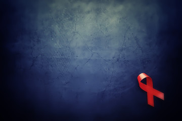 Symbol of human immunodeficiency virus disease. Red ribbon. A helping hand and support.