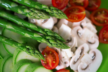 asparagus tomatoes and white cut mushrooms