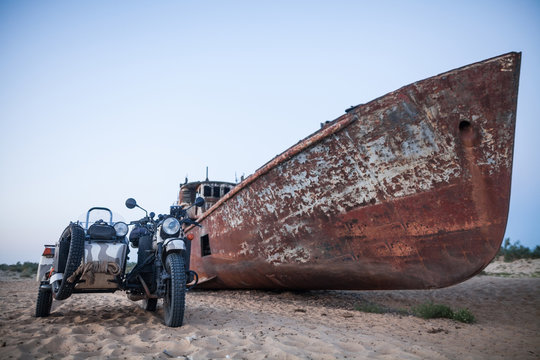 Wrecked ship and a sidecar motorcycle