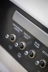 Fototapeta premium Control panel with switches in a luxury speed boat