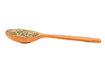 Dry rosemary in a spoon