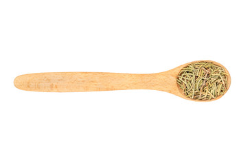 Dry rosemary in a spoon