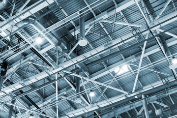 metal roof of the building with a complex system of ventilation, fire extinguishing and burglar alarm. Toned image