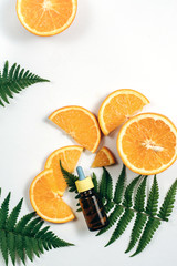 Citrus fruit essential oil, vitamin c serum, beauty care aroma therapy. Organic Spa Cosmetic With Herbal Ingredients Toning. High dose vitamin c synthetic for skin. Flat lay, top view, copy space