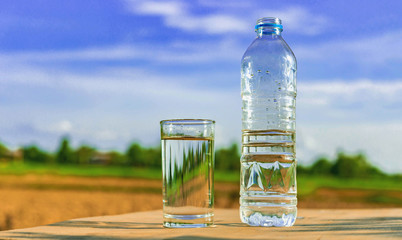 Clean water on wooden floors Natural background (health concept)