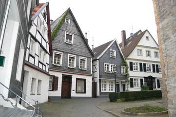 Street view with historical timber frame houses in old town of Germany.