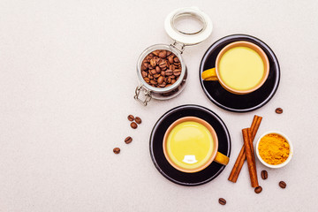 Fototapeta na wymiar Golden turmeric cinnamon coffee latte
