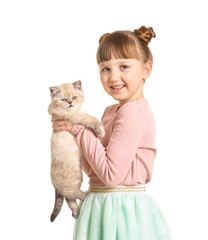 Girl with cute fluffy kitten on white background
