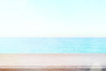 Table top with sea background, sky and cloud in sunny day for product display job showing. Wooden table for display or montage your products.