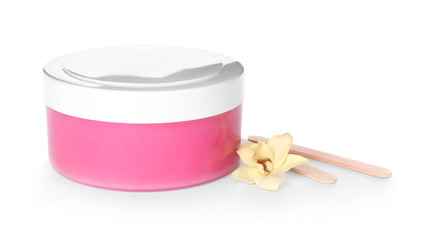 Container with sugaring paste for epilation on white background