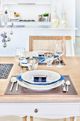 Nicely arranged dining table with ceramics.