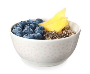 Bowl with tasty chia dessert on white background