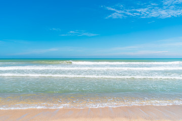 Beautiful tropical beach with blue sky and white clouds abstract texture background. Copy space of summer vacation and holiday business travel concept.