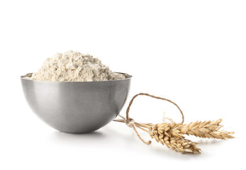 Bowl with flour on white background