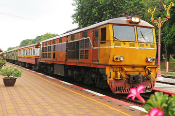 Vintage Yellow Diesel Train Approaching to the Station