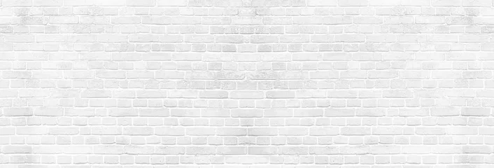 Fotobehang Panoramische achtergrond van brede witte bakstenen muur textuur. Ontwerpachtergrond voor thuis of op kantoor © uv_group