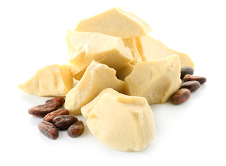 Pieces of cocoa butter on white background