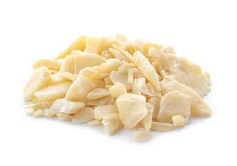 Pieces of cocoa butter on white background