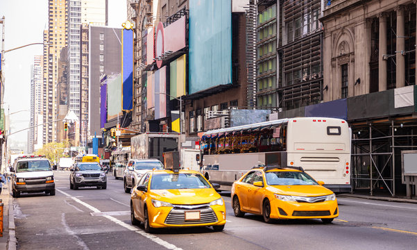 New York, streets. High buildings, colorful signs, cars and cabs © Rawf8